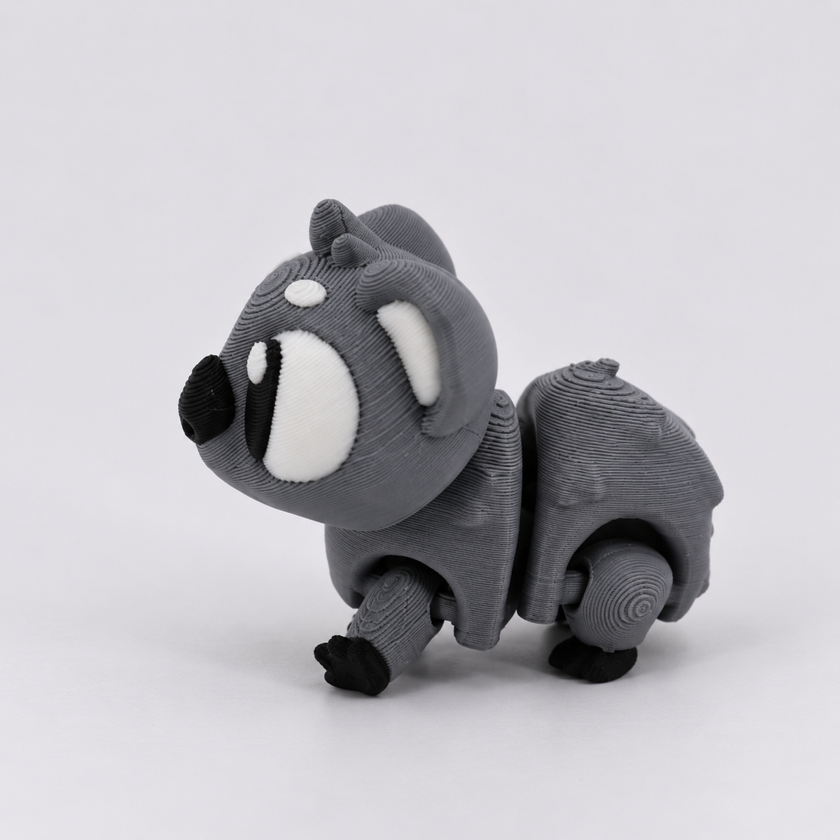 Figurine koala grise imprimée en 3D vue de profil